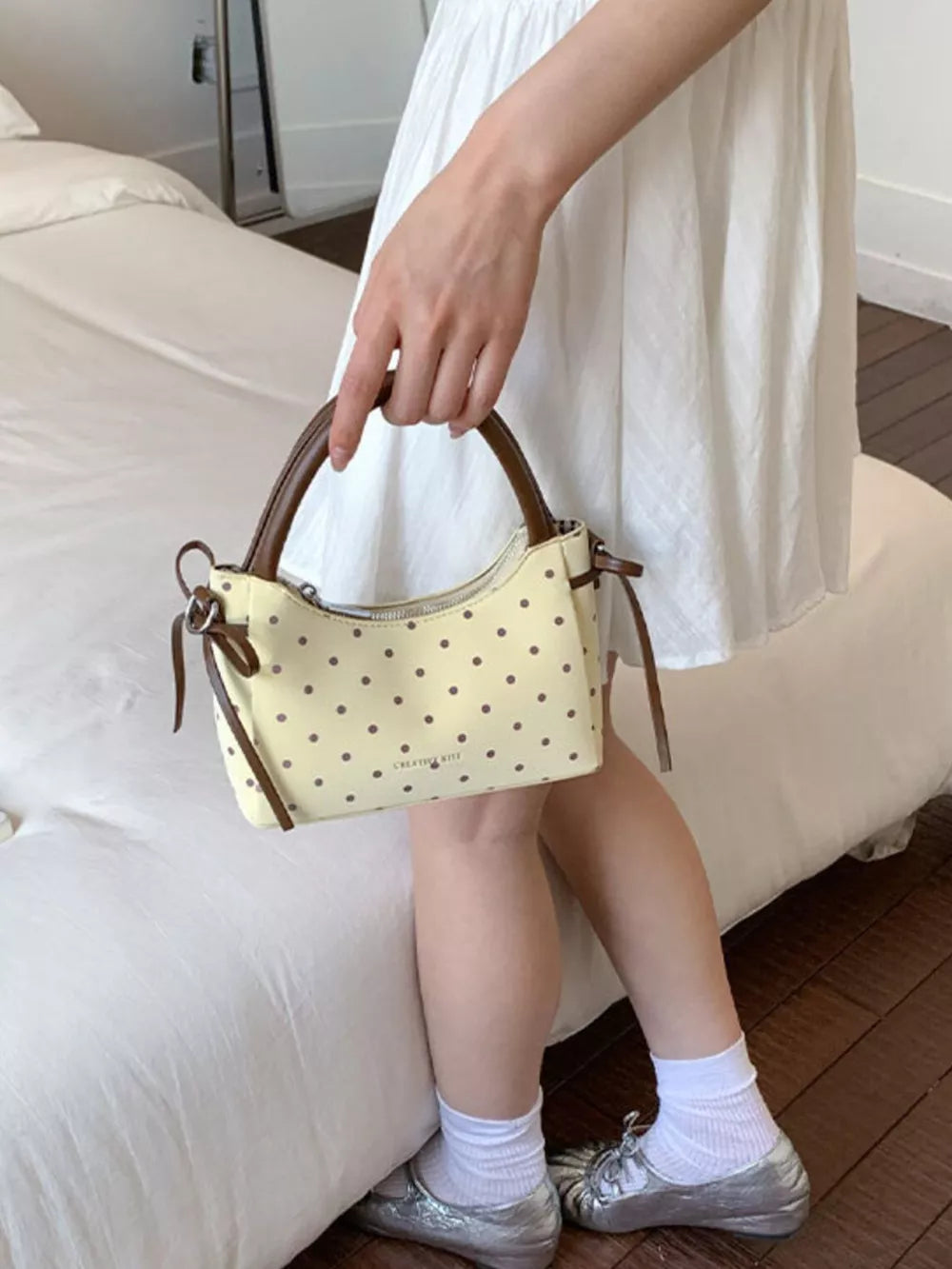 Polka Dot Mini Crossbody Bag in Blue, editorial view