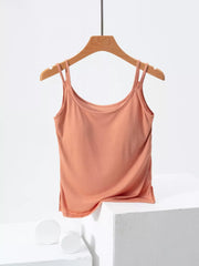 Smooth draped cami in Tangerine with double spaghetti straps and side slits.