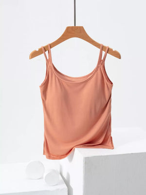 Smooth draped cami in Tangerine with double spaghetti straps and side slits.
