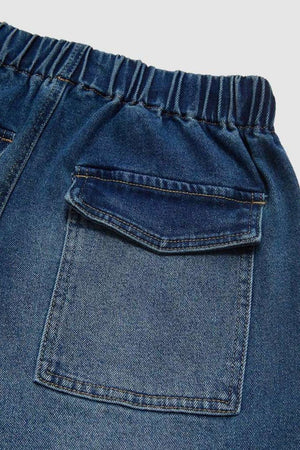 Elastic waist palazzo jeans in medium wash denim with a back patch pocket and contrast stitching.
