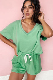 V-neck washed cotton lounge set in Gum Leaf green with drawstring shorts and pockets.