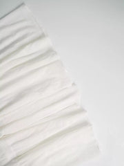 White crinkled tiered maxi skirt with smocked detail