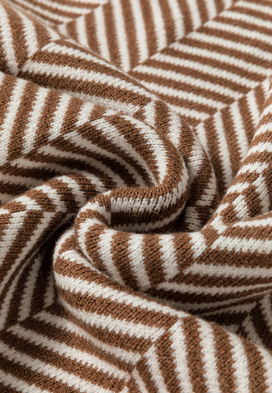 Chevron knit crewneck sweater in camel and white with a textured weave.