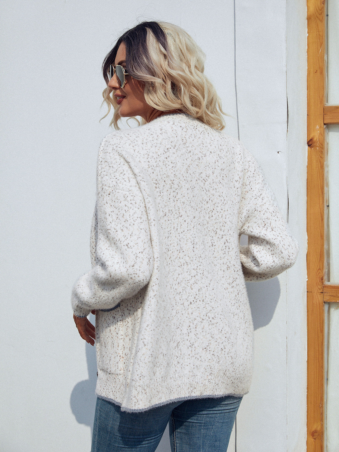 Textured knit cardigan in white with speckle detail and contrast trim