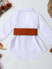 Toddler white belted long sleeve shirt dress with classic collar and button front.