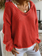 Red open-knit slouchy hooded sweater with a V-neck and relaxed fit.
