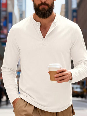 Men's white long sleeve cotton henley t-shirt with button placket.