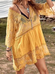 Yellow lace tiered mini dress with crochet trim and bell sleeves.