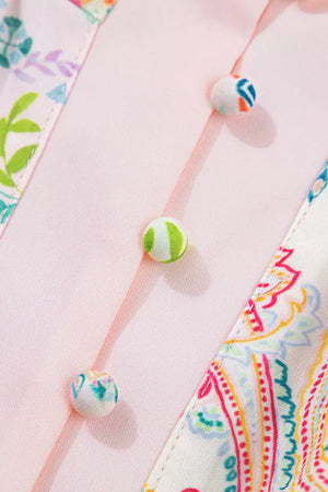 Floral patchwork mini dress with button-down front and colorful fabric-covered buttons.