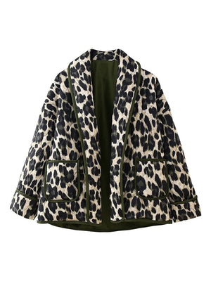 Leopard quilted kimono jacket with pockets and green trim, open front.