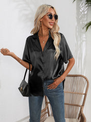 Black satin collared short sleeve buttoned shirt with a relaxed fit.
