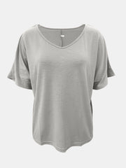 Gray relaxed V-neck tee with dolman sleeves and textured fabric.