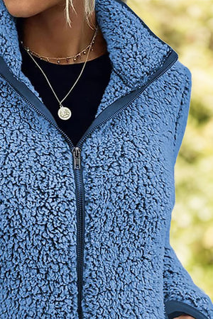 Royal Blue teddy fleece zip-up jacket with a stand-up collar.