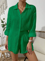 Green textured gauze shirt and shorts set with button front and rolled sleeves.