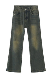 Faded wash flare denim jeans in dark with distressed detailing.