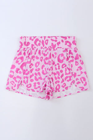 Pink leopard print shorts with elastic waistband and scalloped hem