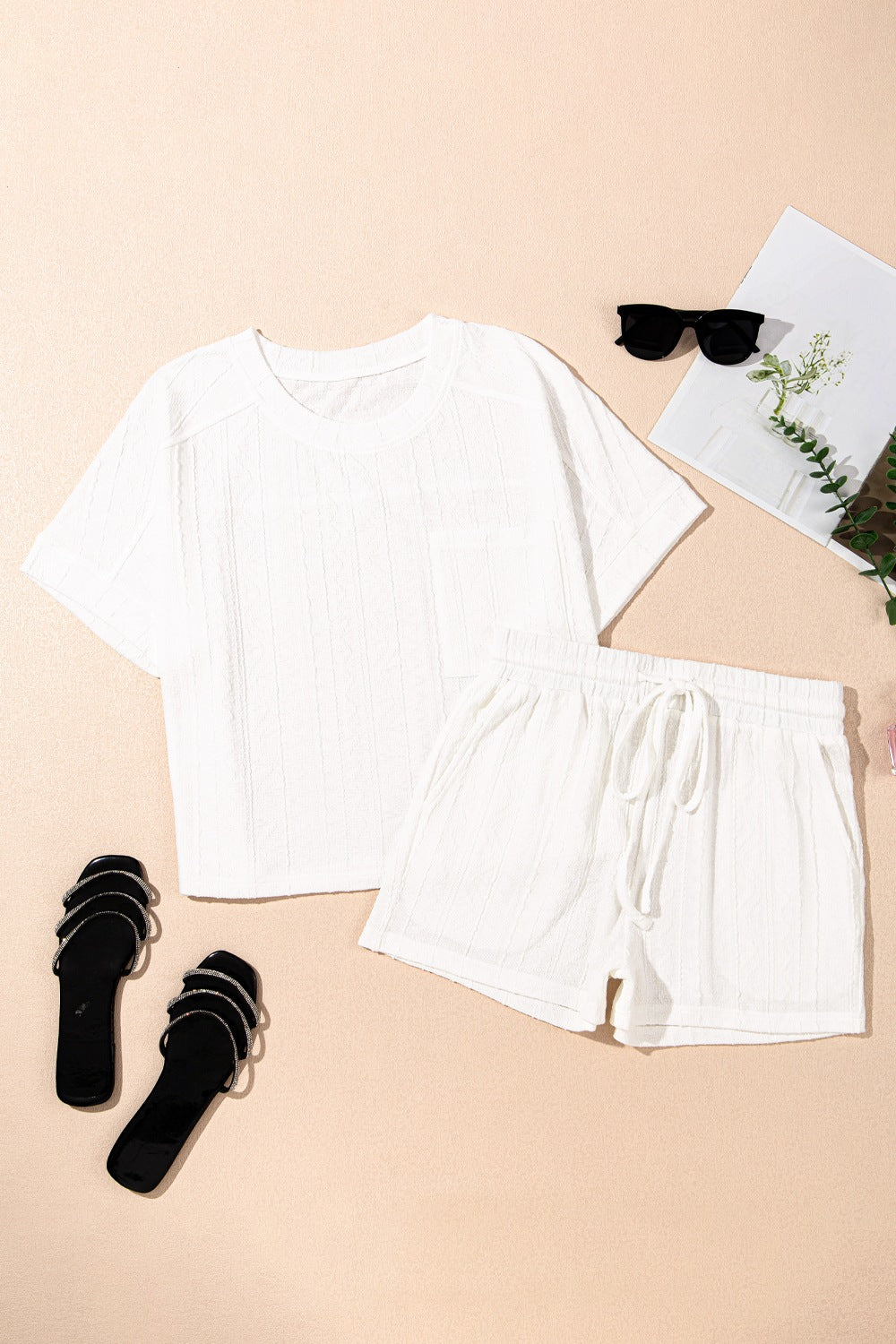 White textured knit drawstring short set with short sleeve top and elastic waist shorts