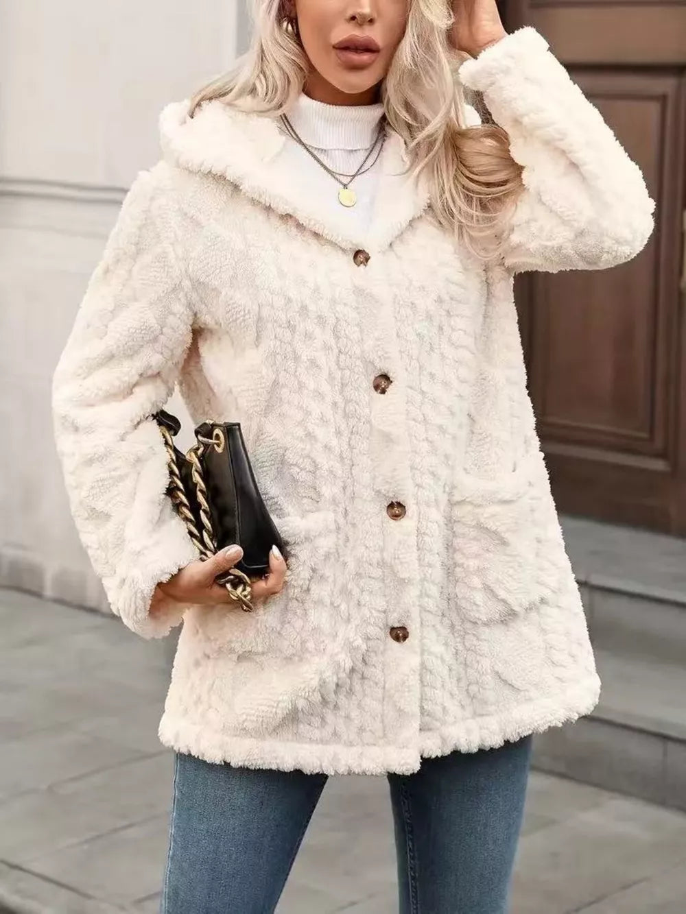 Plush hooded fleece trench coat in cream with button-down front and pockets.