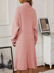 Dusty Pink ribbed knit midi dress with a high neck and long sleeves.