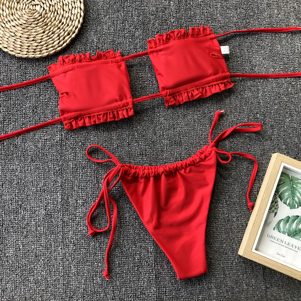 Red bandeau bikini set with ruffles and tie sides.