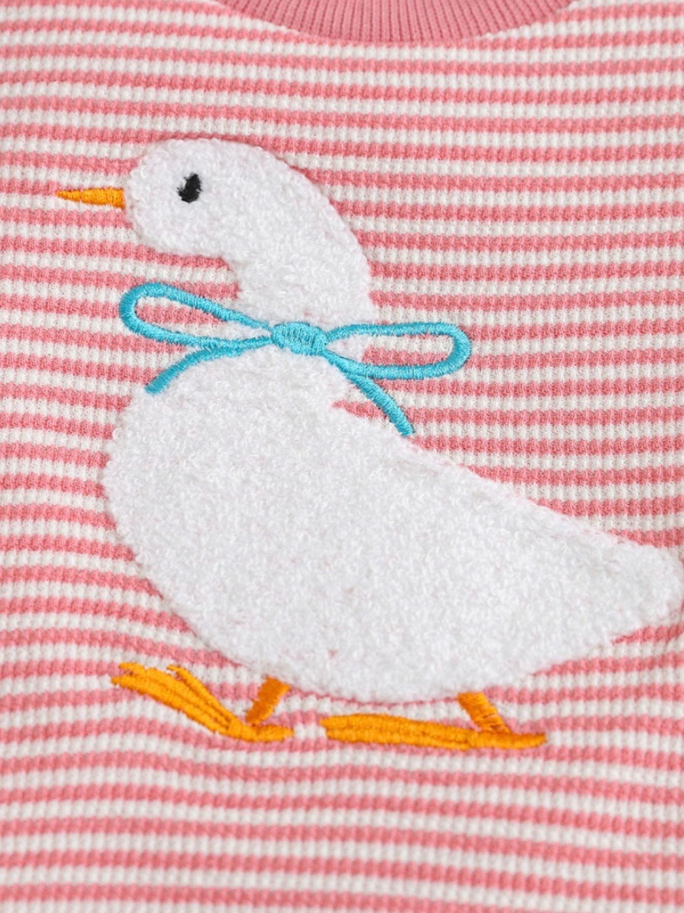 Baby set with embroidered duck and blue bow on pink stripe cotton blend fabric.