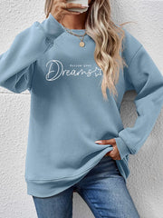 Misty Blue oversized sweatshirt with "Dreams follow your" script graphic and crew neck.