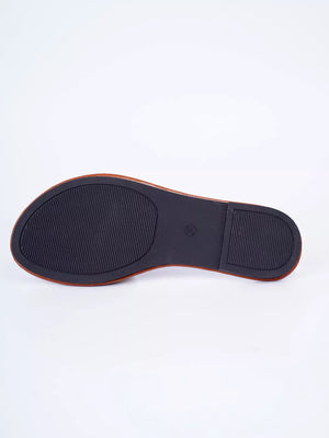 Embroidered artisan open-toe sandals sole detail, black rubber sole with textured grip.