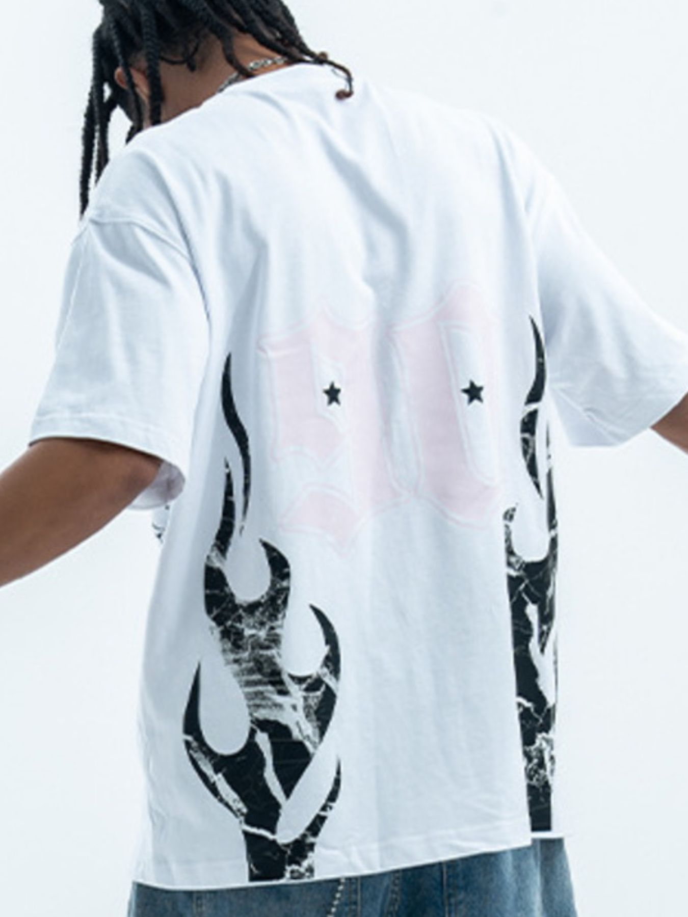 White cotton graphic t-shirt with oversized fit, crew neck, and flame print.