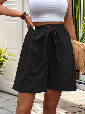 Black linen bermuda shorts with pleats and tie waist detail