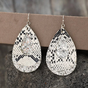 Python print and glitter teardrop dangle earrings in silver.