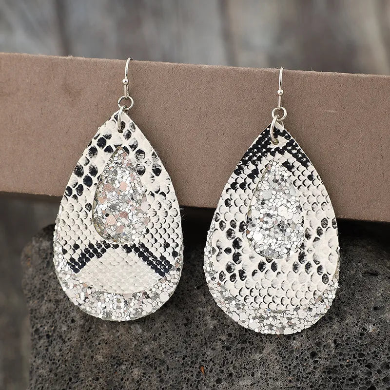 Python print and glitter teardrop dangle earrings in silver.