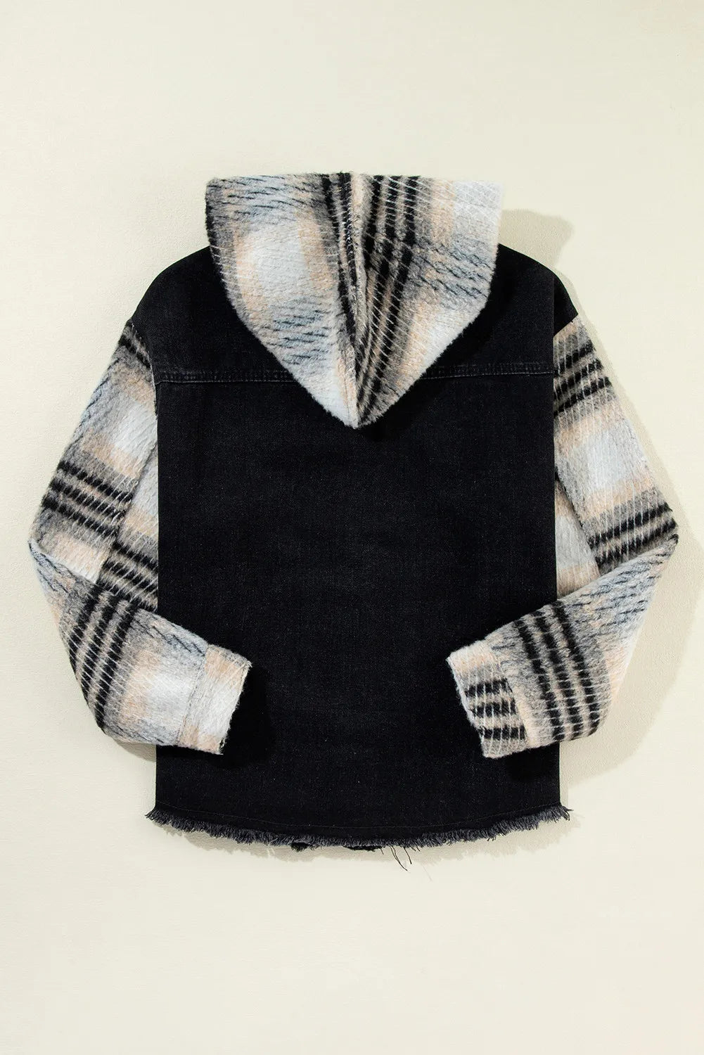 Black denim trucker jacket with plaid flannel sleeves and hood