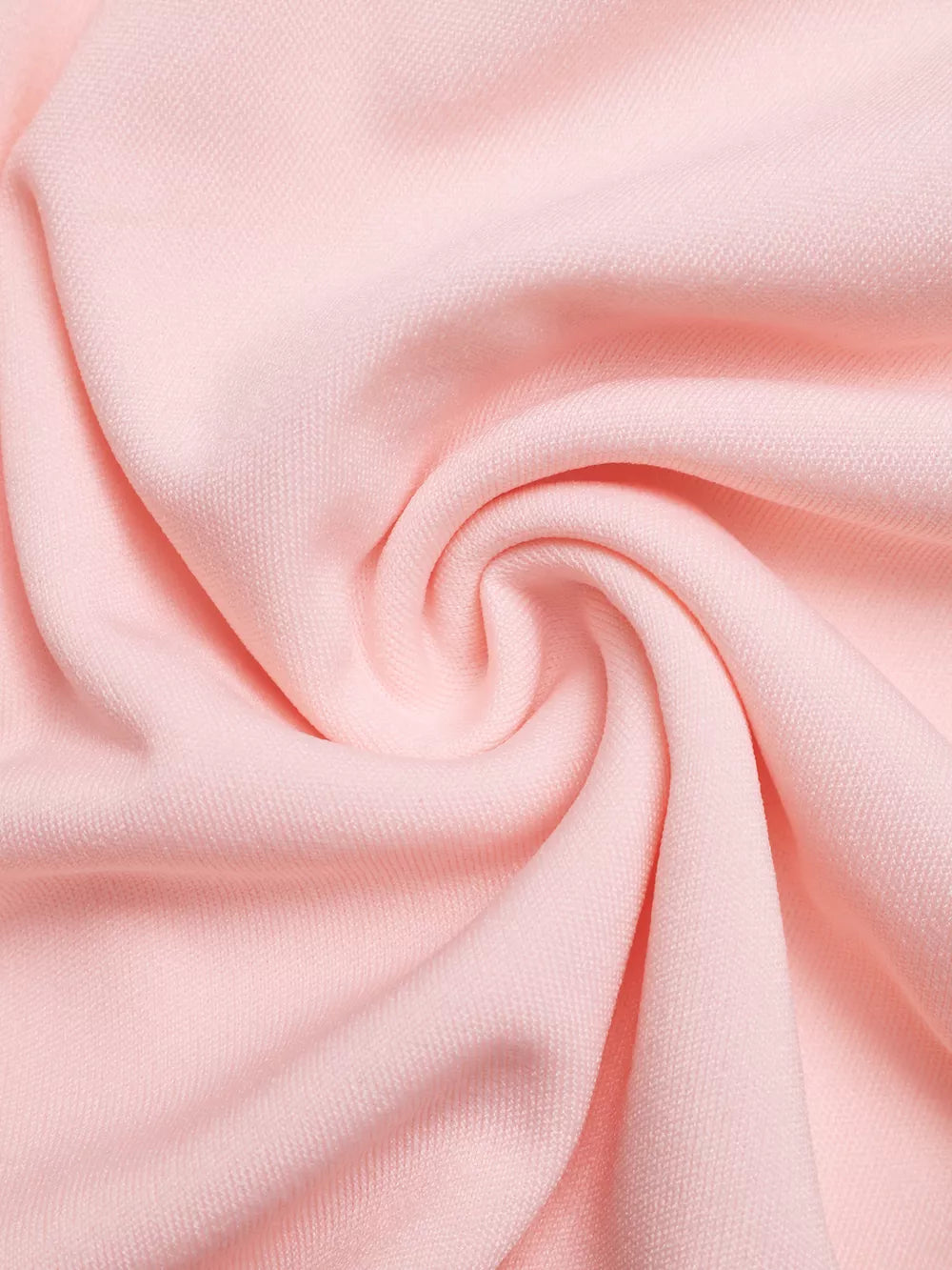 Pink fabric detail of a structured shoulder top with pleated midi skirt set