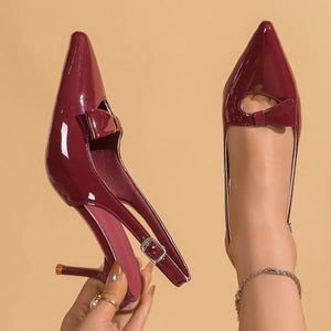 Burgundy patent slingback pumps with bow detail and ankle strap.