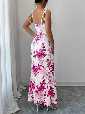 Floral print maxi dress with tie straps and a flared hem.