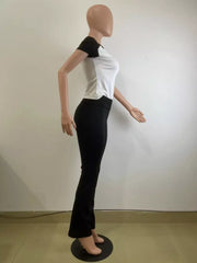 Chic contrast two-piece set with white tee and black flared pants.