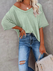 Light green waffle knit relaxed V-neck t-shirt with short sleeves.