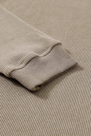 Khaki ribbed knit sweatshirt cuff detail and textured fabric