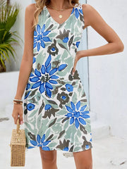 Botanical print mini dress in Blue-green Flower with crochet detail on straps and V-neck.