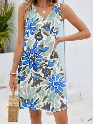 Botanical print mini dress in Blue-green Flower with crochet detail on straps and V-neck.