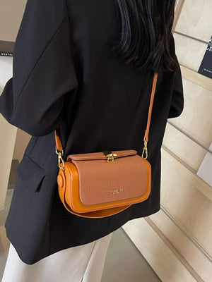 Adjustable Strap Crossbody Bag in Brown, model styling view