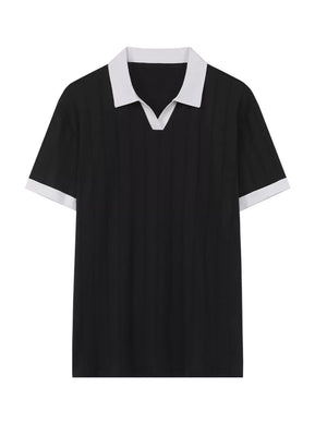 Black cotton polo shirt with white contrast trim collar and sleeves
