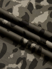 Sleek mock neck tee in a grey camouflage print fabric.