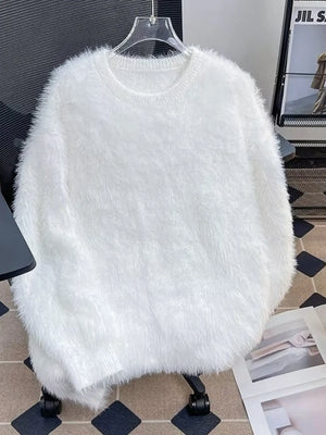 White fluffy knit pullover sweater with crew neck and long sleeves.