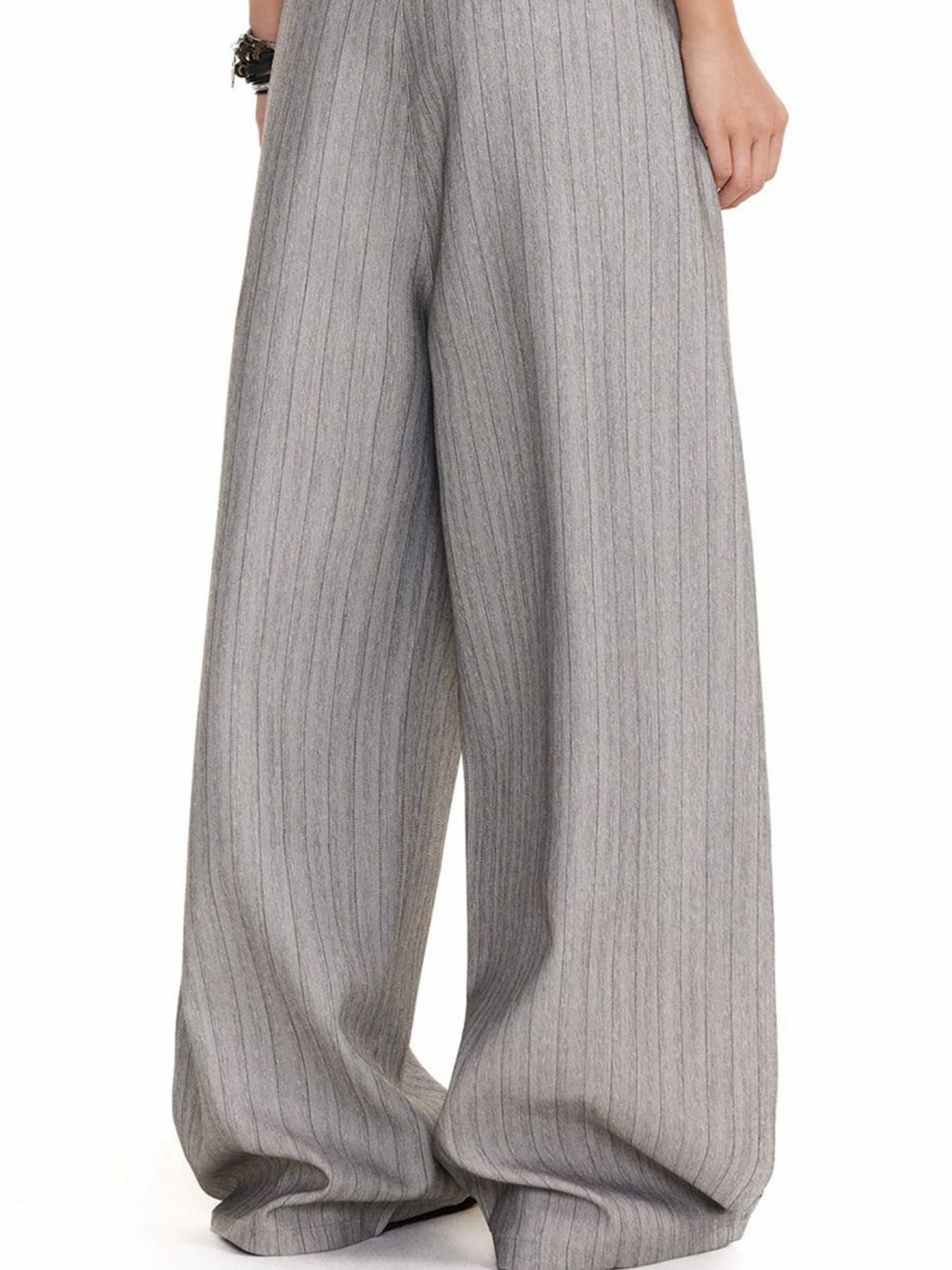 Men's grey pinstripe wide leg sweatpants with a flowy fit.