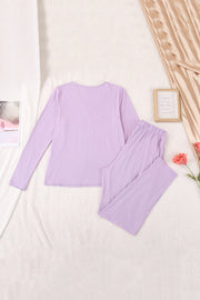 Purple long sleeve top and pleated trousers set
