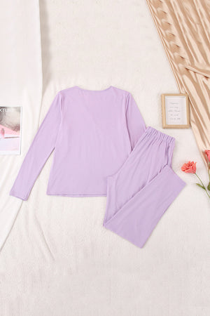 Purple long sleeve top and pleated trousers set