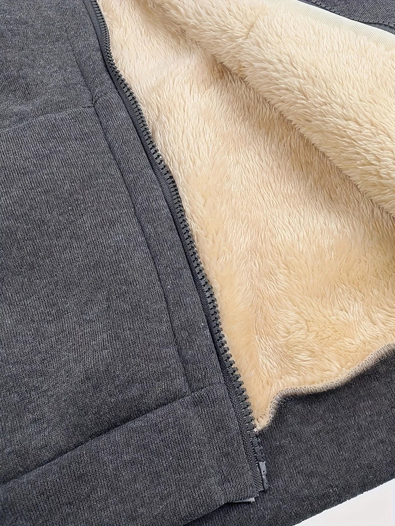 Gray zip-up hoodie with plush sherpa lining detail
