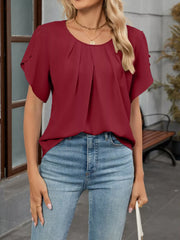 Wine red pleated short sleeve polyester blouse with round neckline.