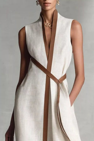 Belted midi dress in white with elegant brown contrast trim and tie belt.